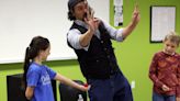 Magician makes large crowd appear at Grand Island library