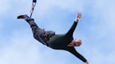 Ed Davey urges voters to take leap of faith as he jumps off platform in stunt