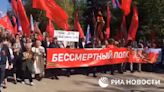 Russians hold parades with Soviet flags in occupied Ukrainian cities