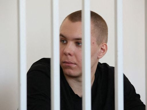 Russian man jailed for burning Koran charged with treason