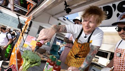 Ed Sheeran makes surprise visit to supermarket to sign autographs in hot sauce