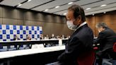 Former Tokyo Olympic official appears in court and says he's not guilty of taking bribes