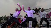 AP PHOTOS: In the spirit of perseverance, artists flock to Congo's biggest dance festival