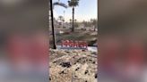 Israeli tank drives over ‘I love Gaza’ sign as military takes control of Rafah crossing