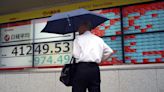 Stock market today: Asian stocks mixed with volatile yen after Wall Street rises on inflation report