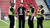 Protestor chains himself to a goalpost ahead of Scotland-Israel women's match