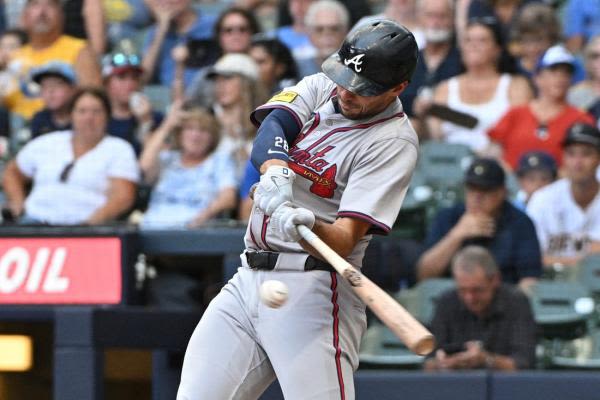 Braves use clutch hits, power display to down Brewers