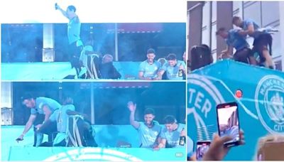 Jack Grealish comes close to falling off Man City’s title parade bus TWICE as things turned wild