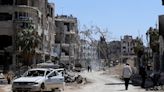 Members of global chemical weapons watchdog vote to keep Syria from getting poison gas materials