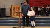St. Mary’s Catholic School first-grader receives certificate, trophy for fundraising work