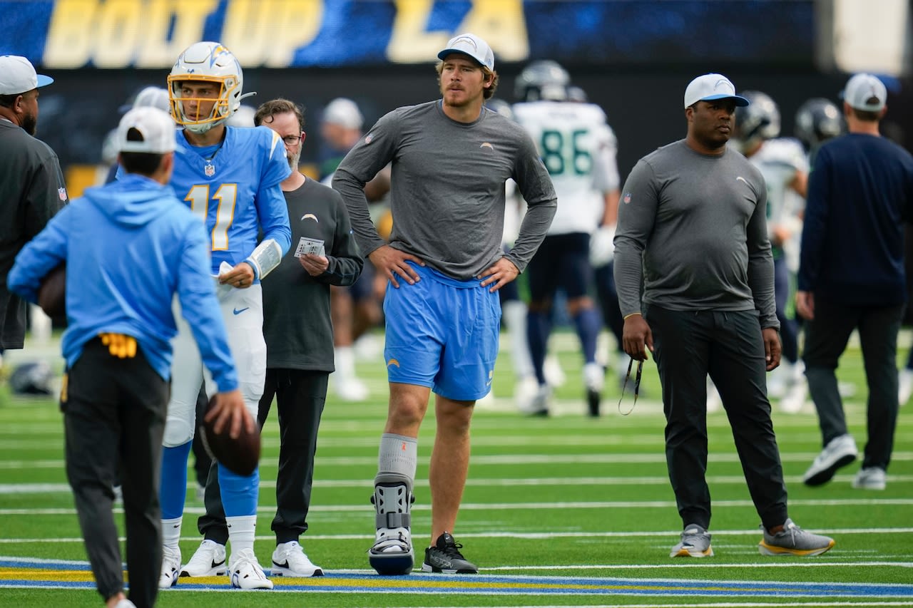 Jim Harbaugh not worried about Justin Herbert missing practices following foot injury