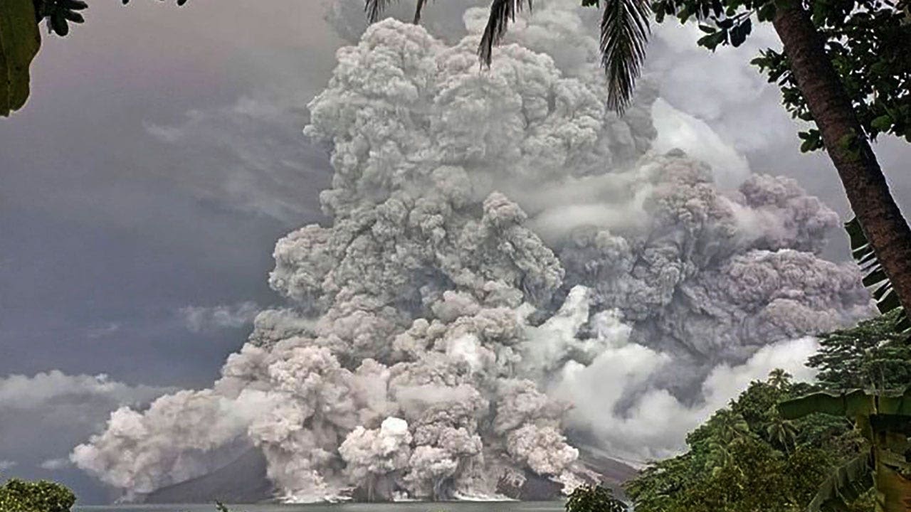 Indonesia’s Ruang volcano spits more hot ash after eruption forces schools and airports to close