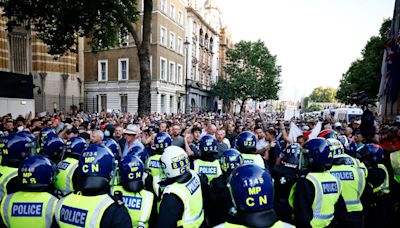 Boy, 14, among those charged over disorder outside Downing Street