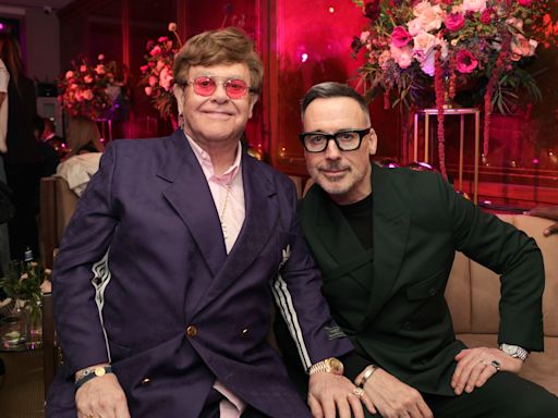 Elton John’s Husband David Furnish ‘Catering to His Every Whim’ as He Heals From an Eye Infection