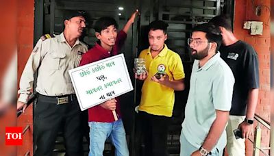 Students chase MSU officials to handover ₹2,000 collected in coins for VC’s damages | Vadodara News - Times of India