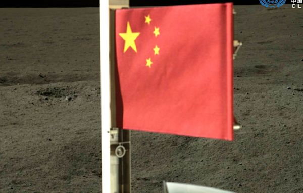 Craft unfurls China's flag on the far side of the moon and lifts off with lunar rocks to bring home