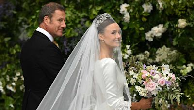 Olivia Henson Battles the Wind (in an Heirloom Tiara!) at Her High Society Wedding Attended by Royal Family