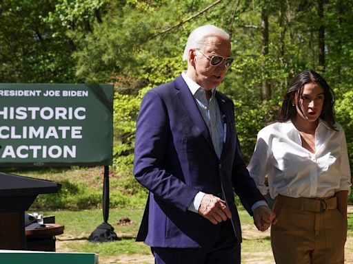 AOC rallies to Biden's side as progressives split over backing his 2024 campaign