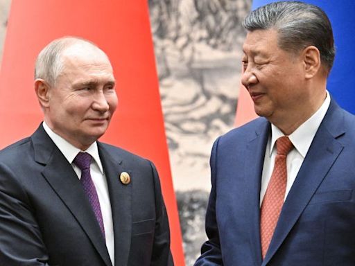 Russia adopts Chinese yuan-to-ruble as benchmark exchange rate after US sanctions force a further move away from the dollar