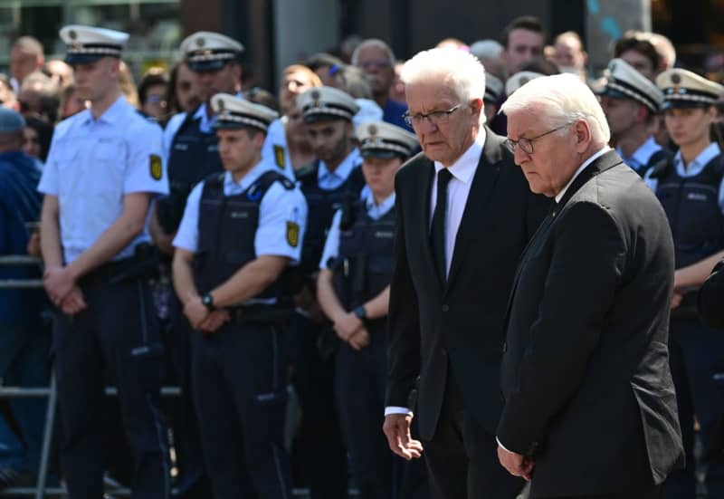 German president pays respects to slain officer stabbed in Mannheim