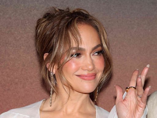 Jennifer Lopez Poses Next to "Don't F With JLo" Billboard Amid Ben Affleck Divorce Rumors