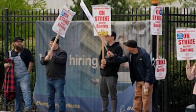 Boeing freezes hiring in sweeping cost cuts as it grapples with factory worker strike