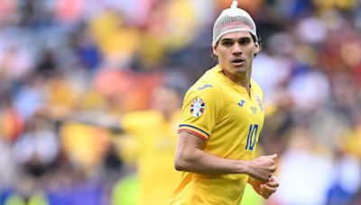 Fans left baffled as Romania star Ianis Hagi wears NETTING on his head