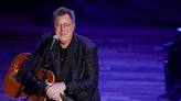 Vince Gill Dedicates Emotional Performance Of " Go Rest High on That Mountain" To Loretta Lynn