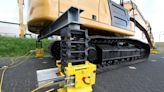 Enerpac cube jacks aid excavator undercarriage maintenance