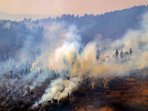 Firefighters make progress against massive blaze in California ahead of warming weather