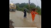 Viral: With umbrellas and torches, pointsmen lead train through waterlogged track in Madhya Pradesh