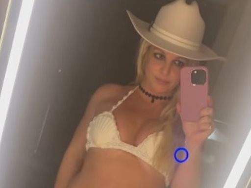 Britney Spears is 'proud' of her recent weight loss as she models white bikini