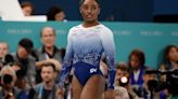 A slip on the balance beam and penalties on the floor cost Simone Biles another gold medal