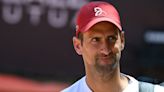 Novak Djokovic wears bicycle helmet to Italian Open training session after getting hit in the head with bottle