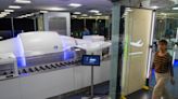 TSA unveils passenger self-screening lanes at Vegas airport as 'a step into the future'