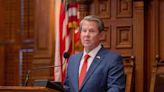 Kemp signs election law changes that critics argue creates more barriers to Georgia voters