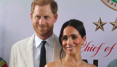 How Meghan Markle's Angelic Look in Nigeria Honors Princess Diana - E! Online