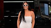 Ashley Graham looks chic in a figure-hugging white lace dress in NYC