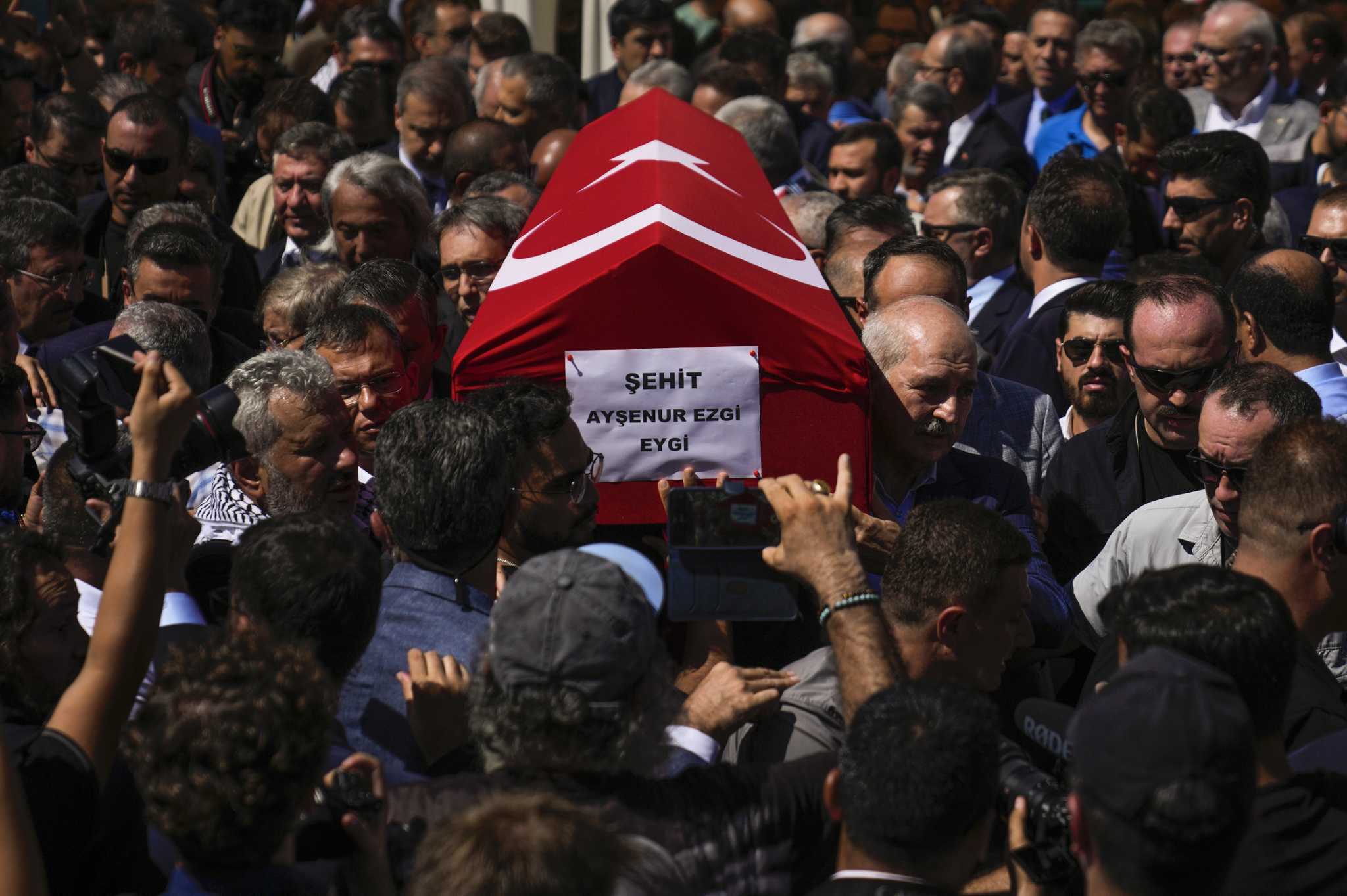 Israel strikes Gaza as an American activist killed by Israeli fire is buried