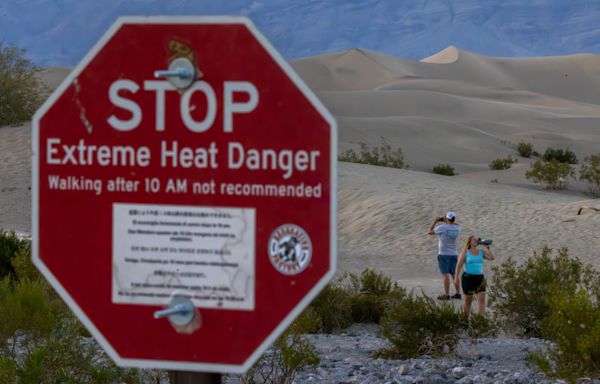 Tourists still flock to Death Valley amid searing US heat wave blamed for several deaths