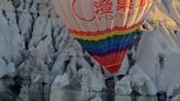 Giant hot air balloon packed with tourists slams into rock formations