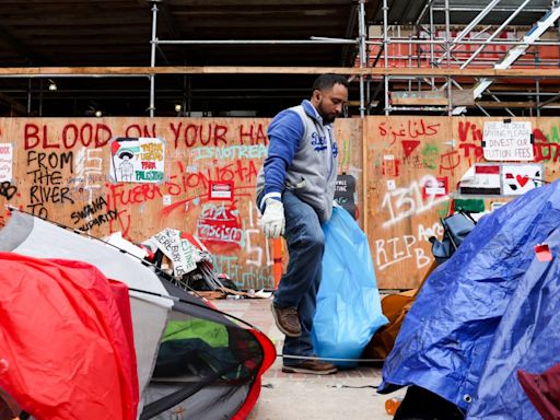 UCLA clears mounds of trash left from pro-Palestinian encampment, counter-protesters