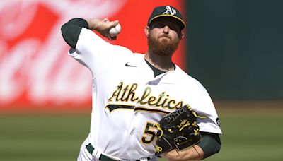 A's trade Blackburn to Mets for right-handed pitching prospect