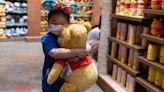 Disney Store Japan sells merch featuring Winnie the Pooh holding up blank white paper