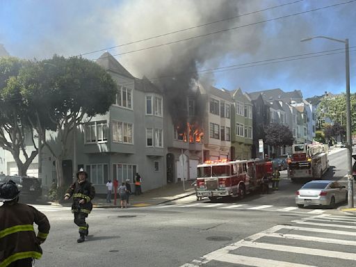 Large fire hits Alamo Square house in SF, 2 people hospitalized