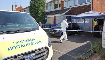 Man and woman found dead in suspected double murder