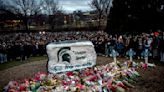 Michigan State University reaches $15 million settlement with families of 3 killed in February shooting, lawyer says