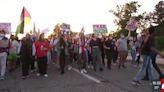 Anti-war protesters march through St. Louis streets near Washington University