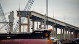 First ship passes through new channel alongside Baltimore bridge wreckage and stranded Dali