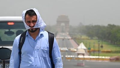 Delhi Weather Live Updates: Capital sees extreme heat at 52.3 deg Celsius; light drizzle follows